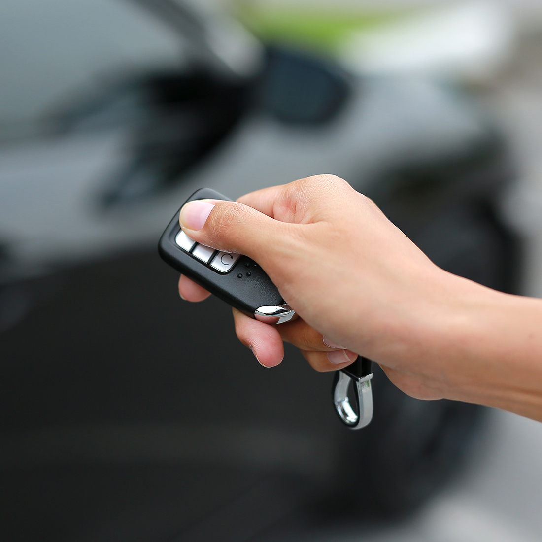 a photo of remote key for car security systems
